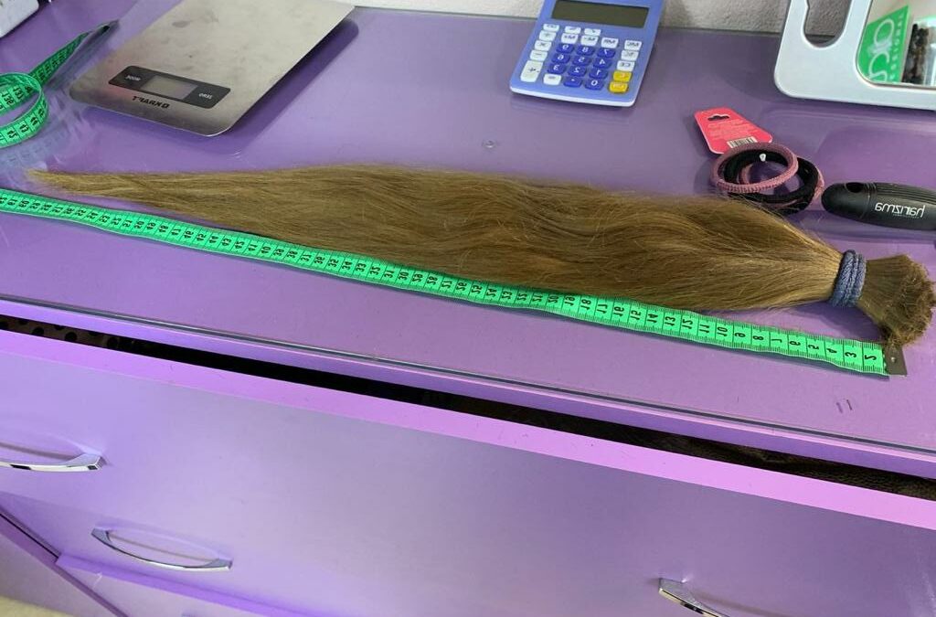Продать длинные волосы